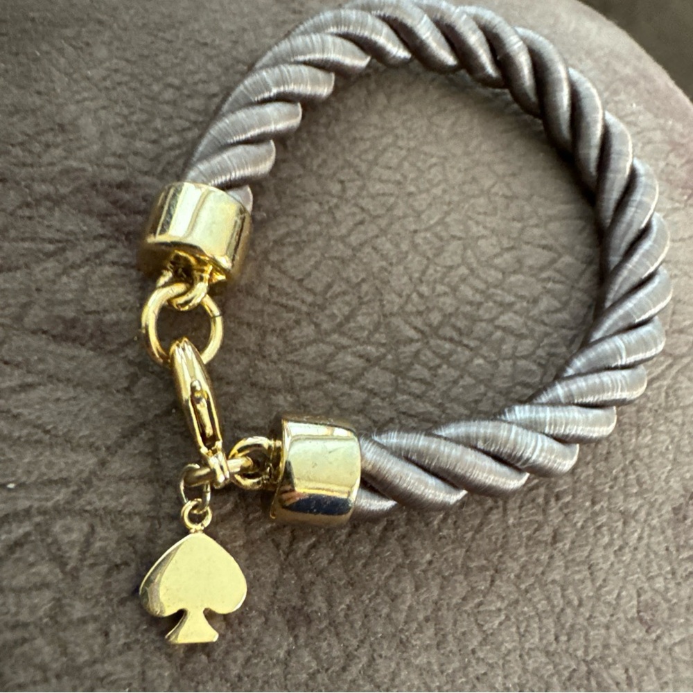 Kate spade tan fabric/gold metal bracelet